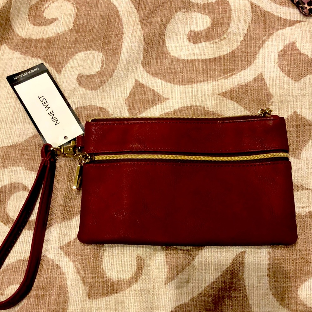 Nine W. vegan leather double zip wristlet with inside credit card apartments